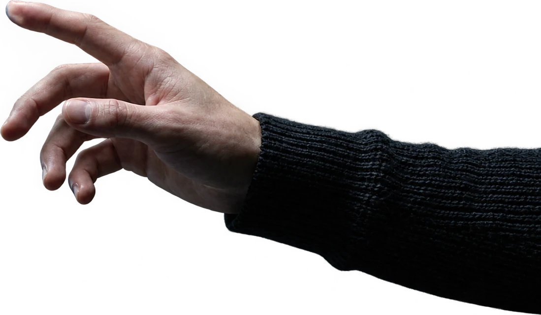 A human hand reaching back toward it